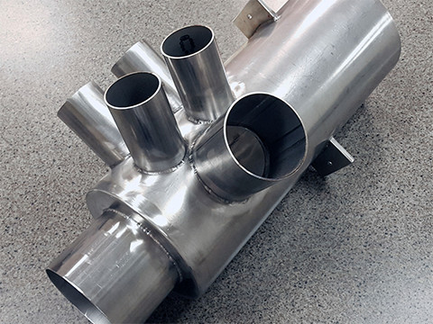Rolled welded tube manifold